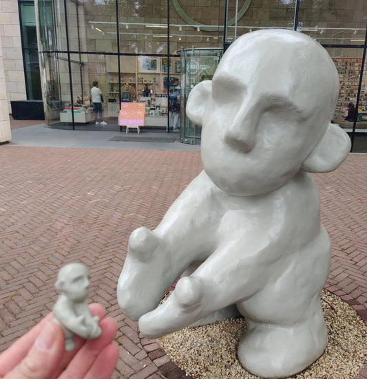Miniatuur beeldje Troost